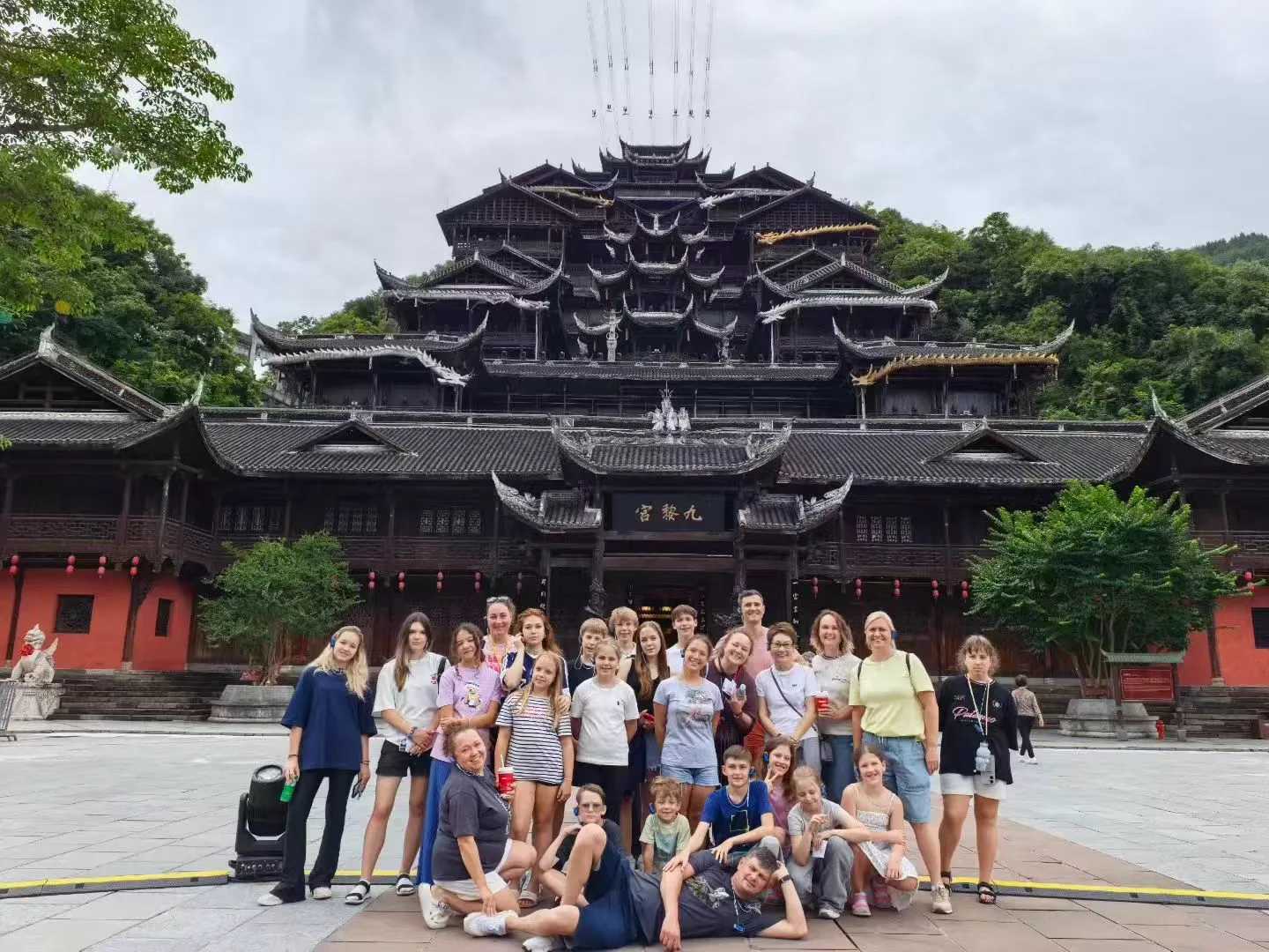 International family visiting a historic neighborhood in China