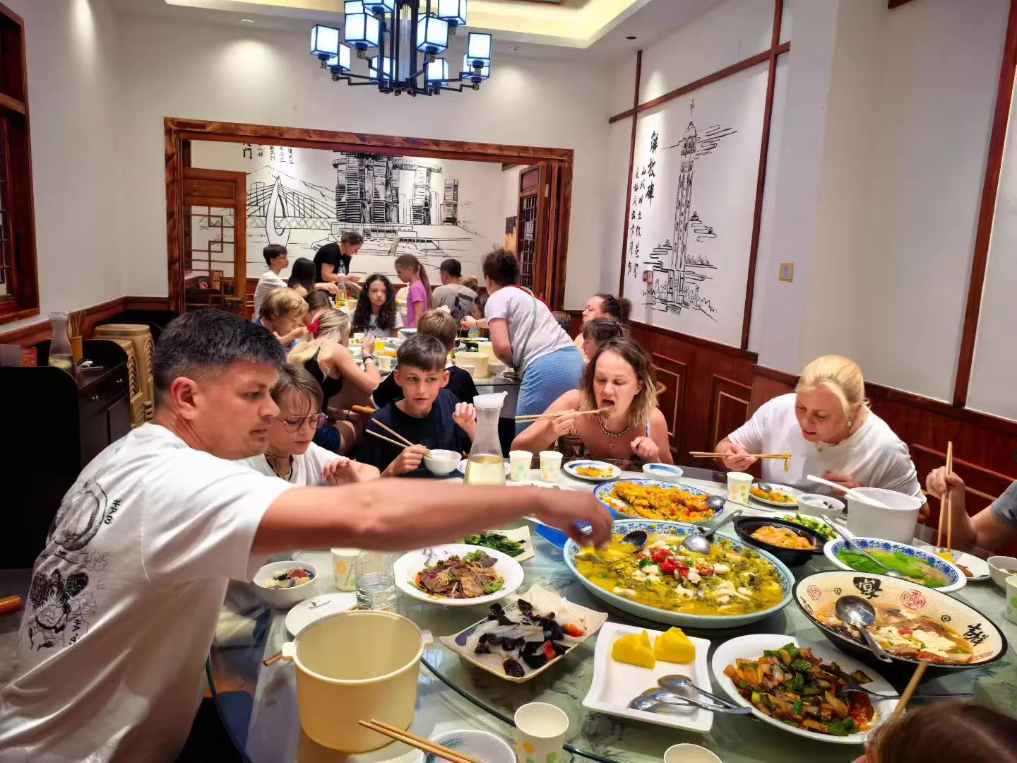 International travelers using a phone during a local food experience in China